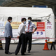 Workers stand in front of a quarantine area set up at a hospital in Seoul.